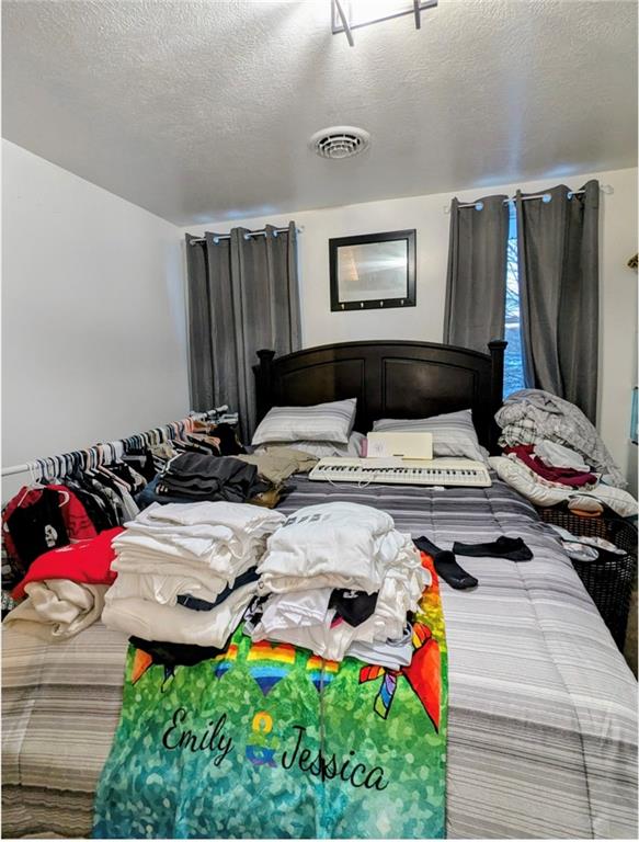 204 Pine Hill Road Kittanning, PA 16201 - Photo 17 of 23 a bedroom with bed and a window