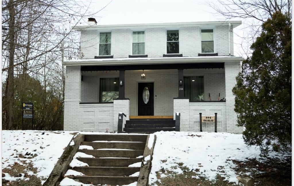 204 Pine Hill Road Kittanning, PA 16201 - Photo 2 of 23 a front view of a house with a porch