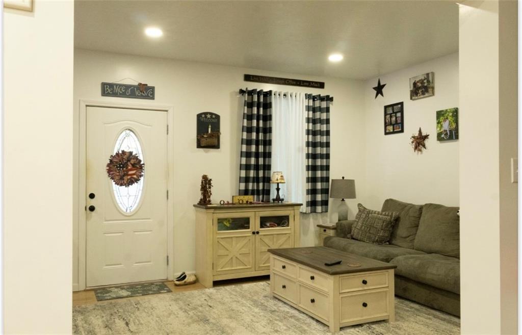 204 Pine Hill Road Kittanning, PA 16201 - Photo 4 of 23 a living room with furniture and a window