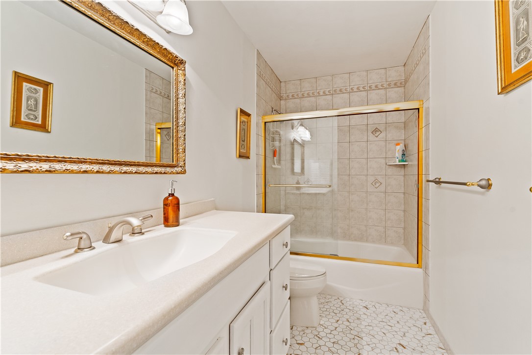 618 Conn Way Vero Beach, FL 32963 - Photo 17 of 36 a bathroom with a sink and a mirror
