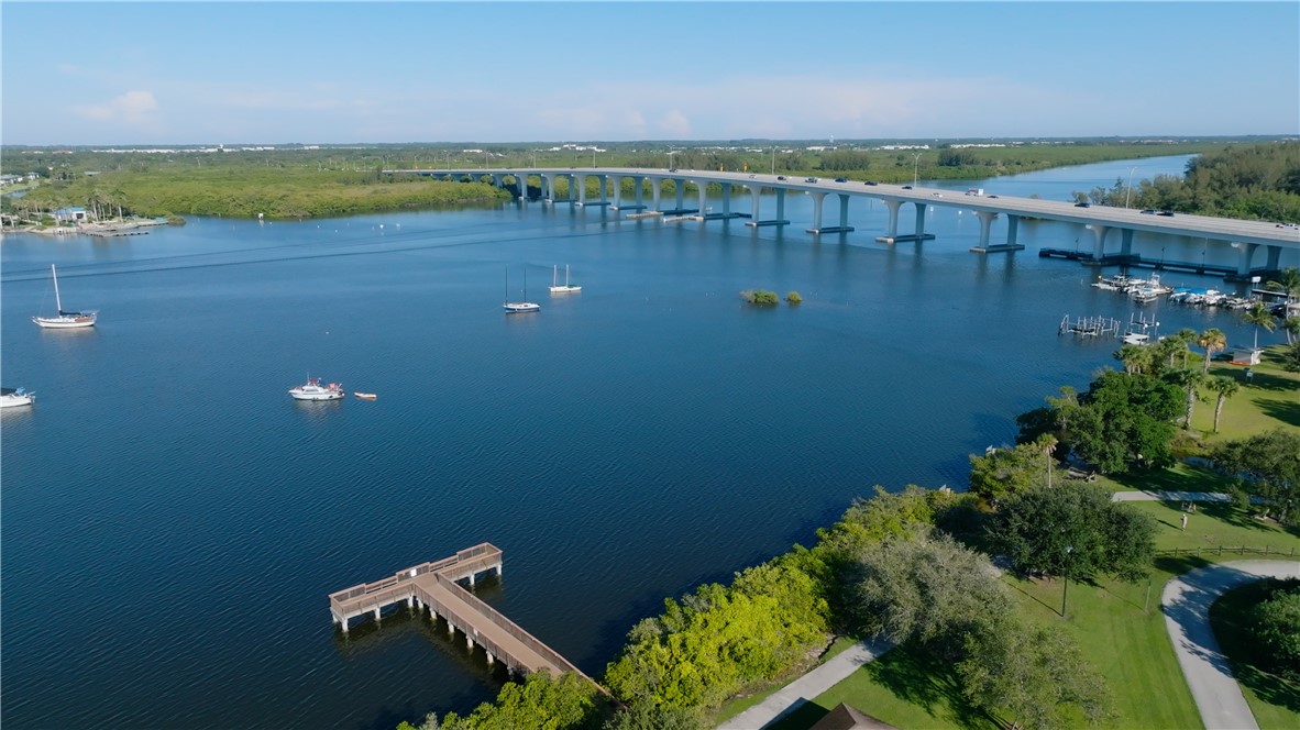 618 Conn Way Vero Beach, FL 32963 - Photo 31 of 36 a view of a lake in middle of the town
