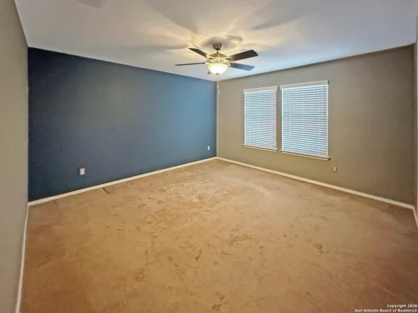 en view of an empty room with a window