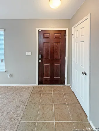 a view of a hallway with closet