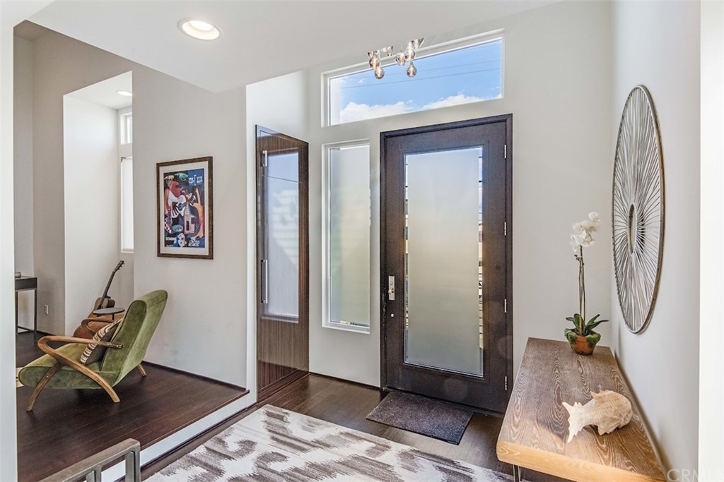 203 South Prospect Avenue, Unit A Redondo Beach, CA 90277 - Photo 12 of 39 a view of a room with gym equipment