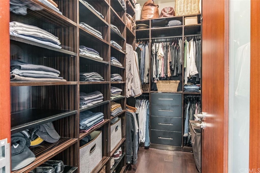 203 South Prospect Avenue, Unit A Redondo Beach, CA 90277 - Photo 21 of 39 a view of walk in closet with clothes and shoes