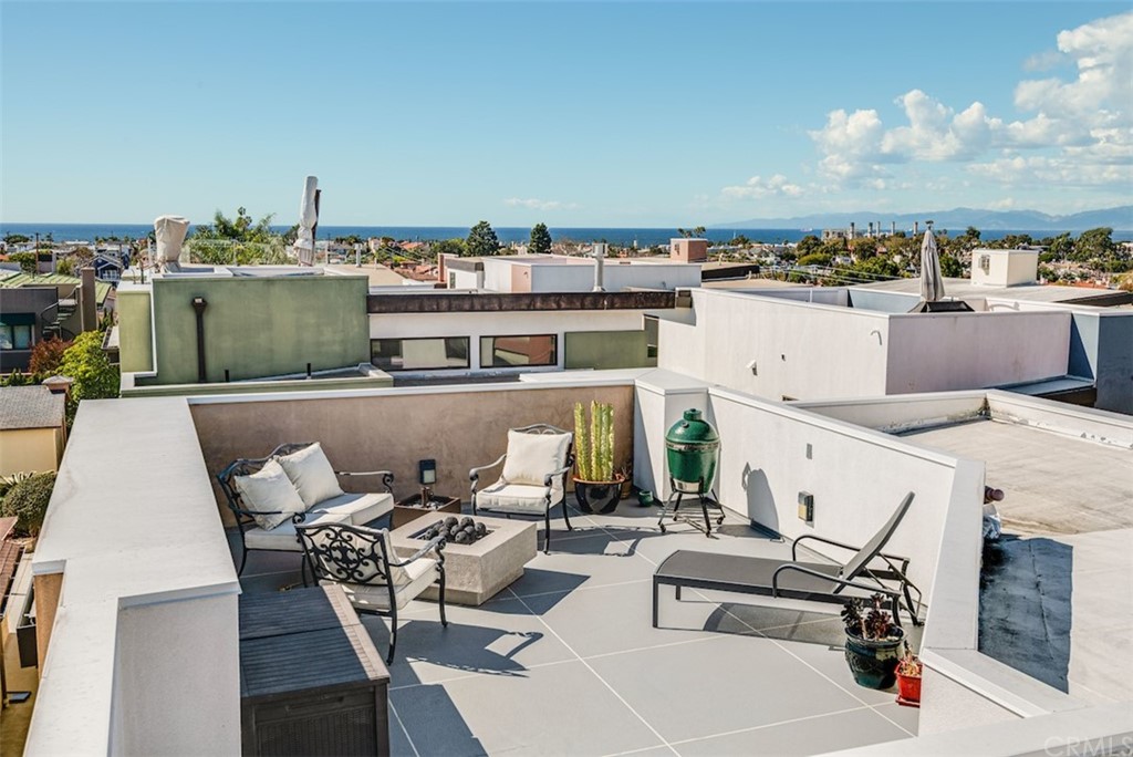 203 South Prospect Avenue, Unit A Redondo Beach, CA 90277 - Photo 35 of 39 a view of a terrace with seating area