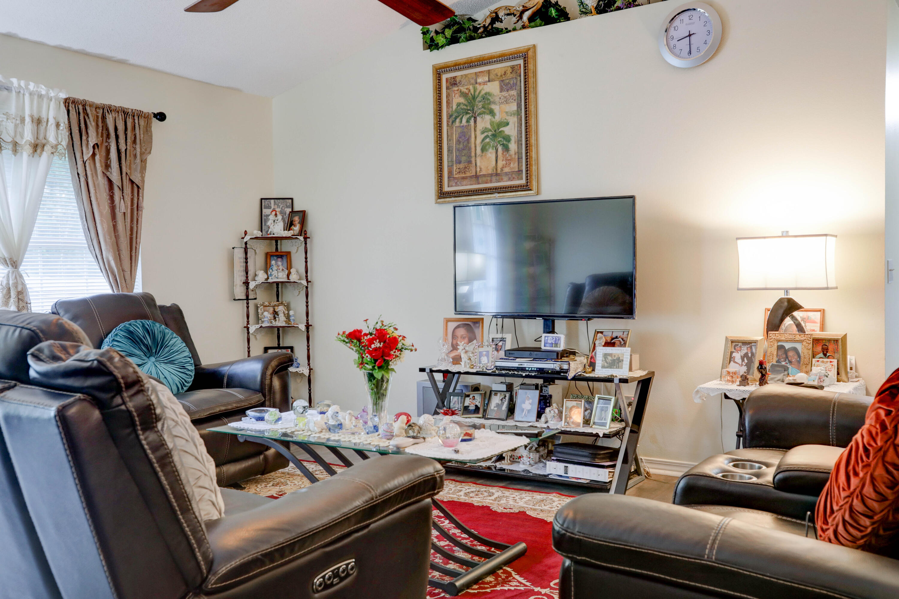 6803 Cedar Ridge Circle Milton, FL 32570 - Photo 11 of 26 a room with furniture and a flat screen tv