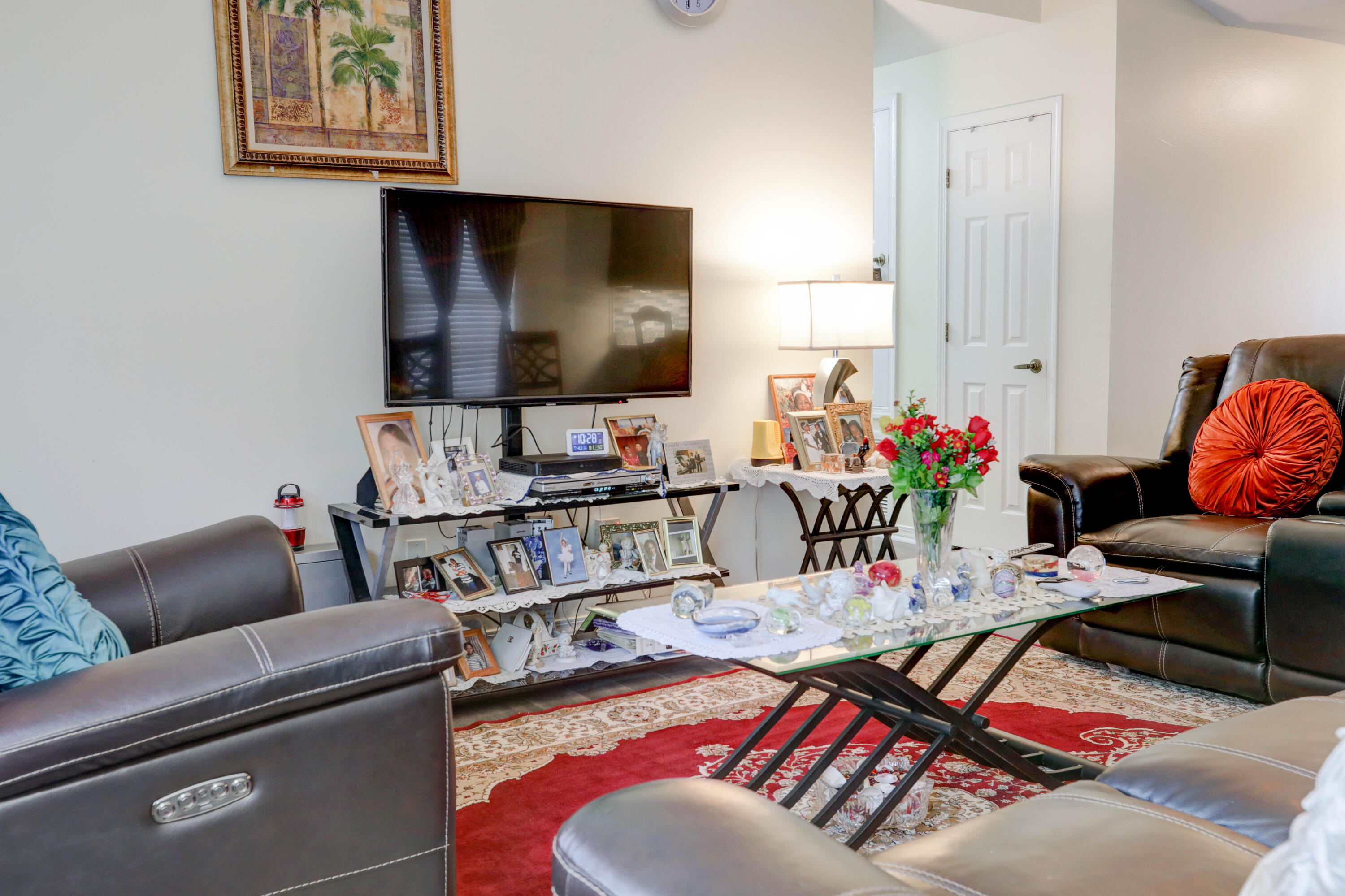 6803 Cedar Ridge Circle Milton, FL 32570 - Photo 12 of 26 a living room with furniture and a flat screen tv