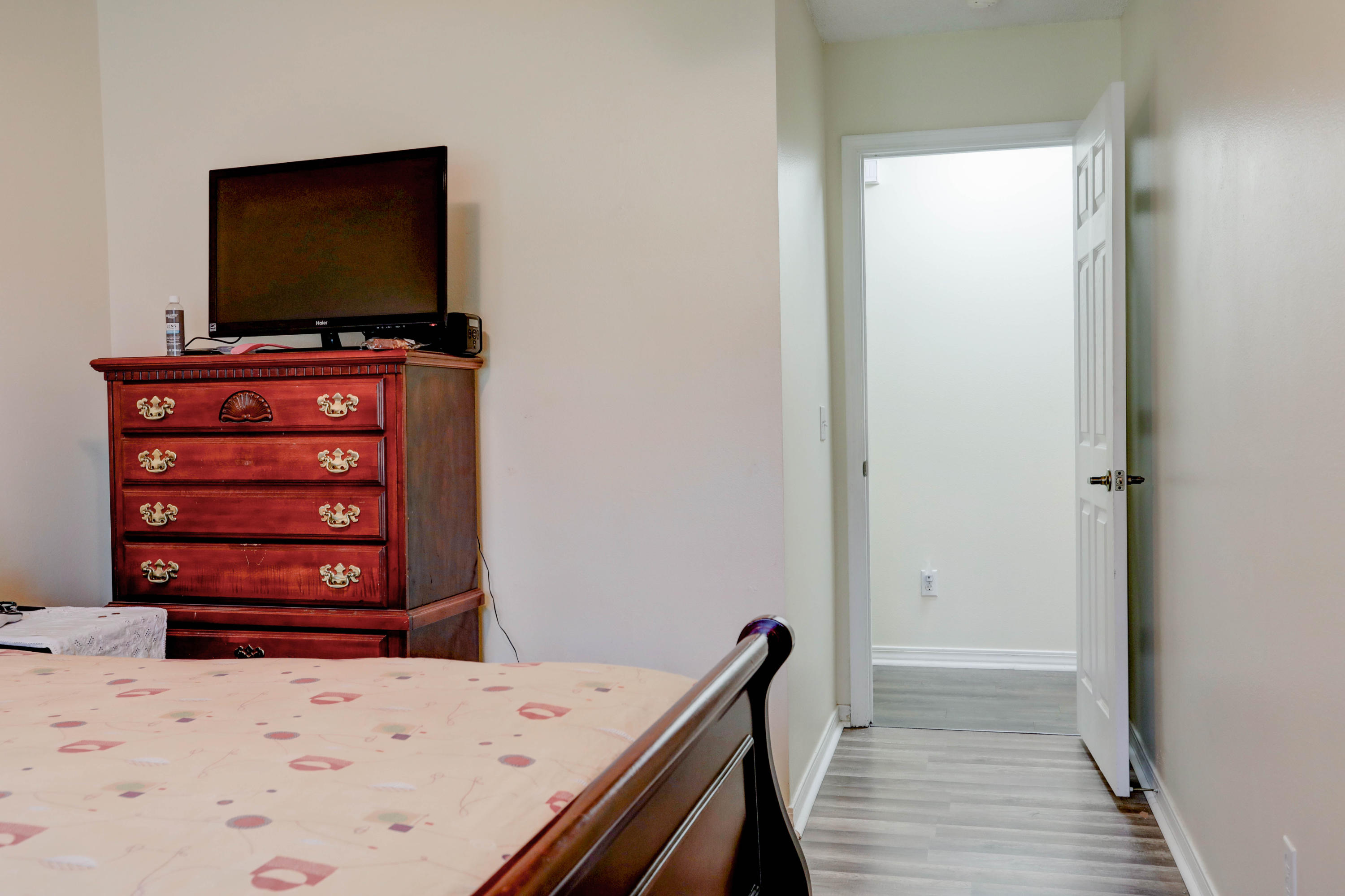 6803 Cedar Ridge Circle Milton, FL 32570 - Photo 18 of 26 a view of a bedroom with wooden floor and closet