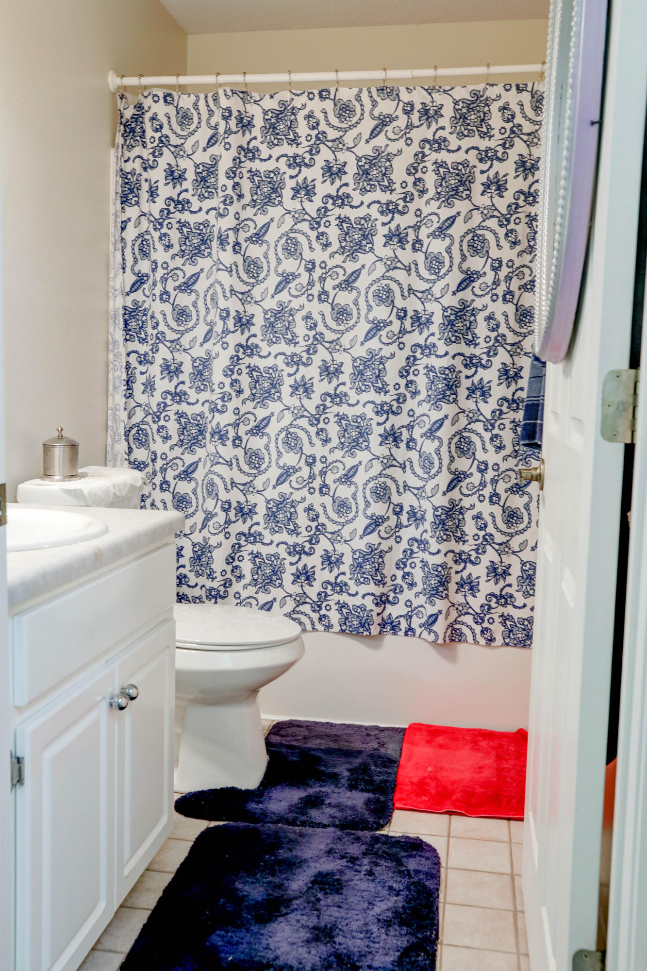 6803 Cedar Ridge Circle Milton, FL 32570 - Photo 19 of 26 a bathroom with a sink toilet and vanity