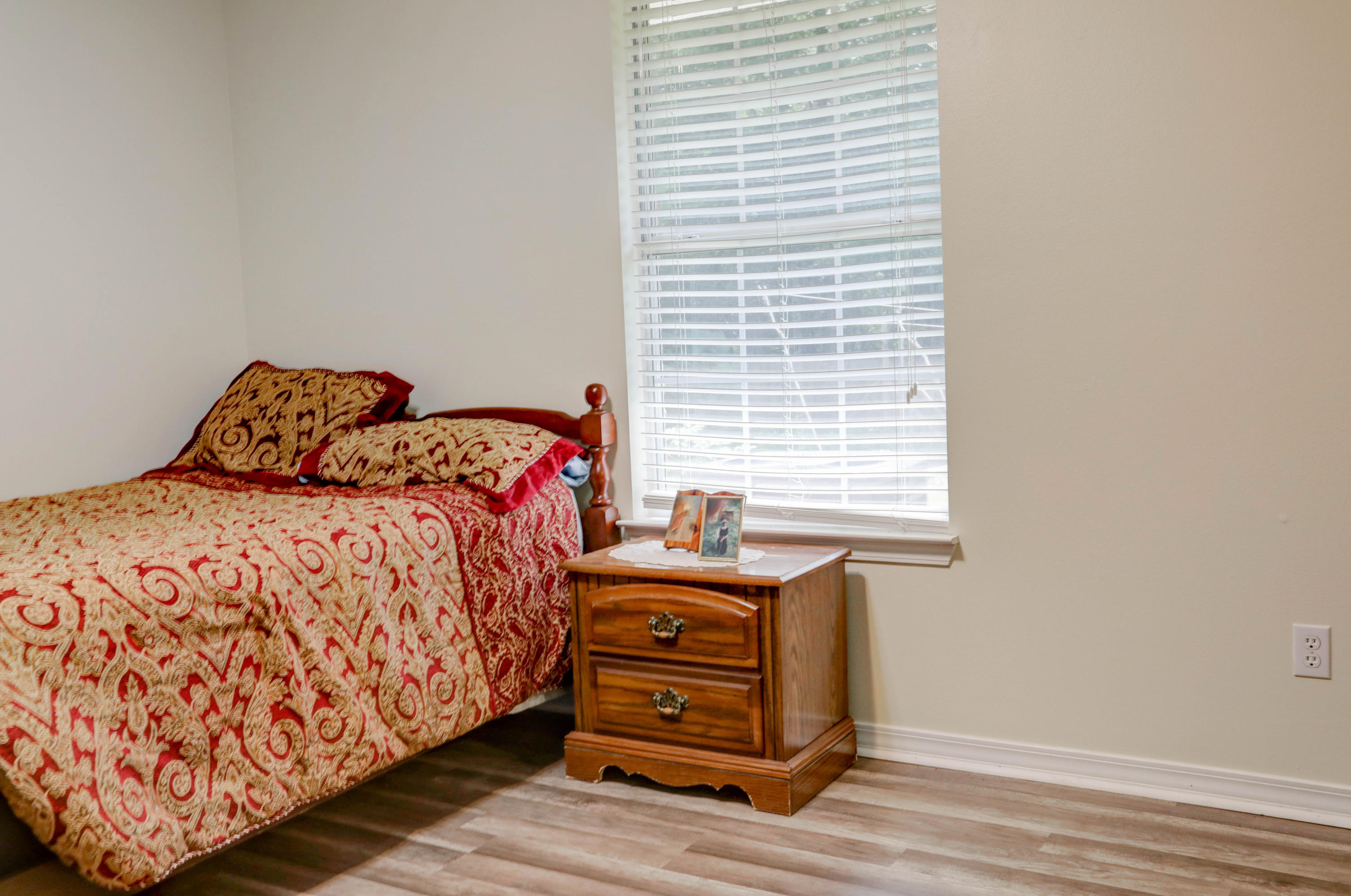 6803 Cedar Ridge Circle Milton, FL 32570 - Photo 20 of 26 a bedroom with a bed and a window