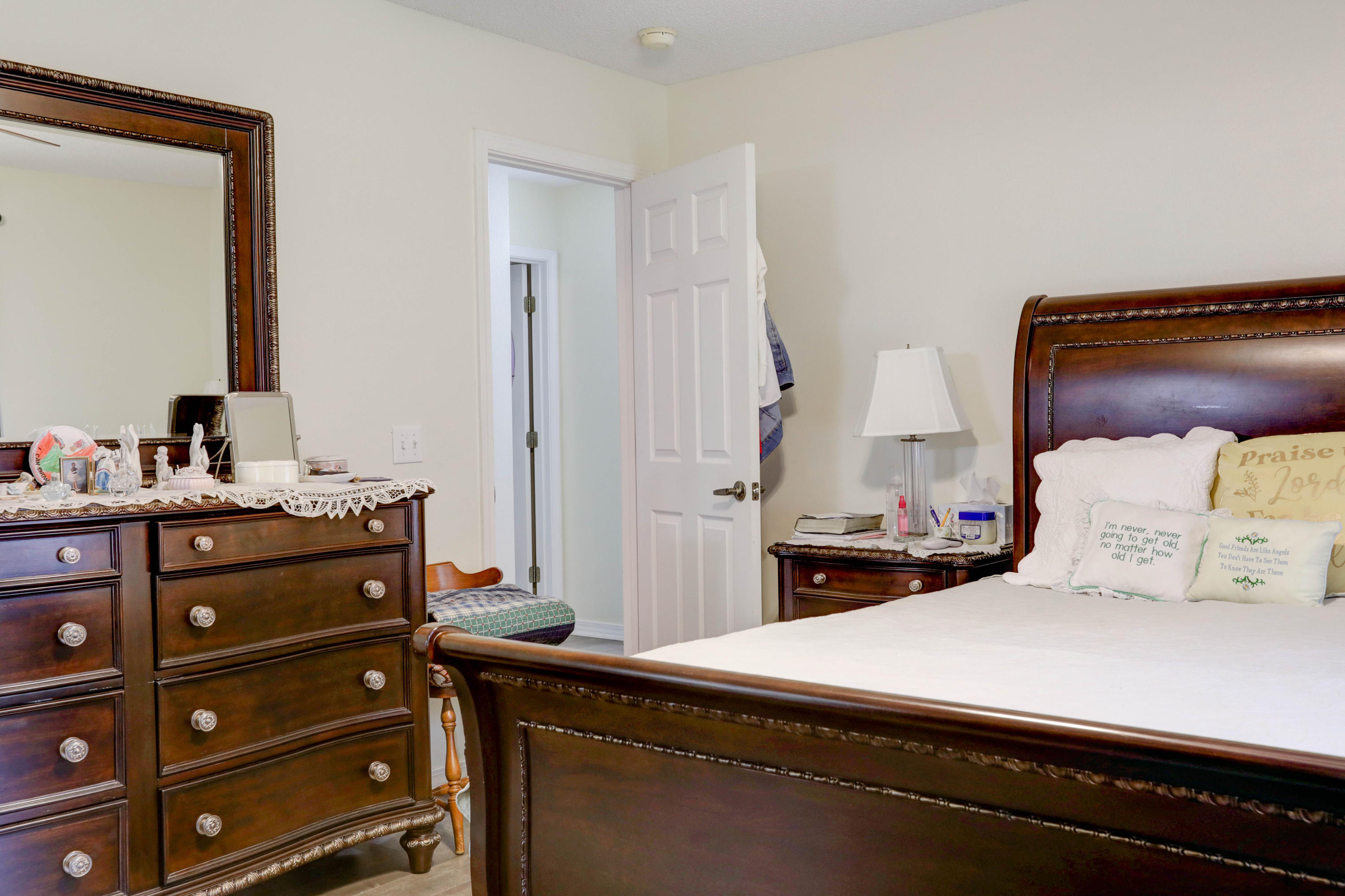 6803 Cedar Ridge Circle Milton, FL 32570 - Photo 23 of 26 a bedroom with a bed and a dresser