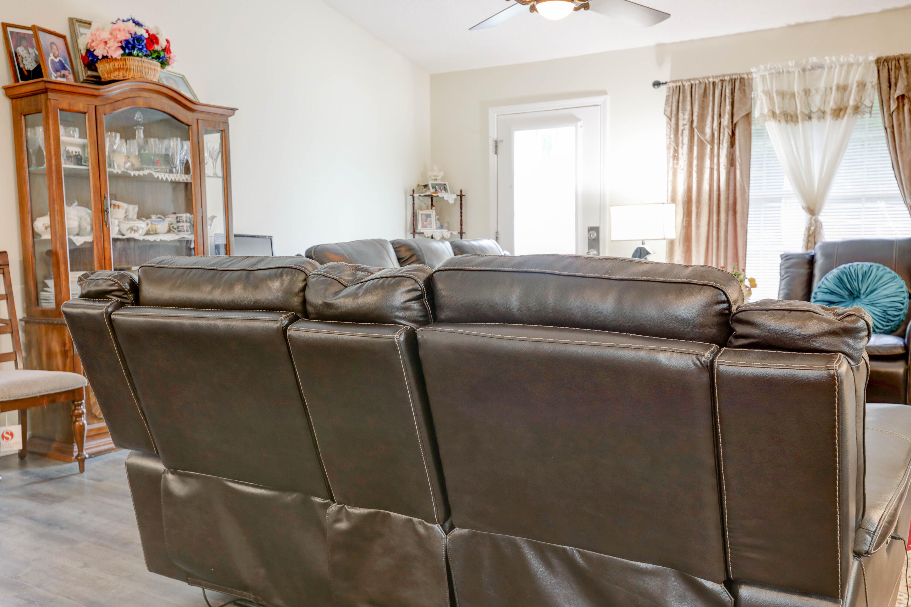 6803 Cedar Ridge Circle Milton, FL 32570 - Photo 10 of 26 a living room with furniture and a window