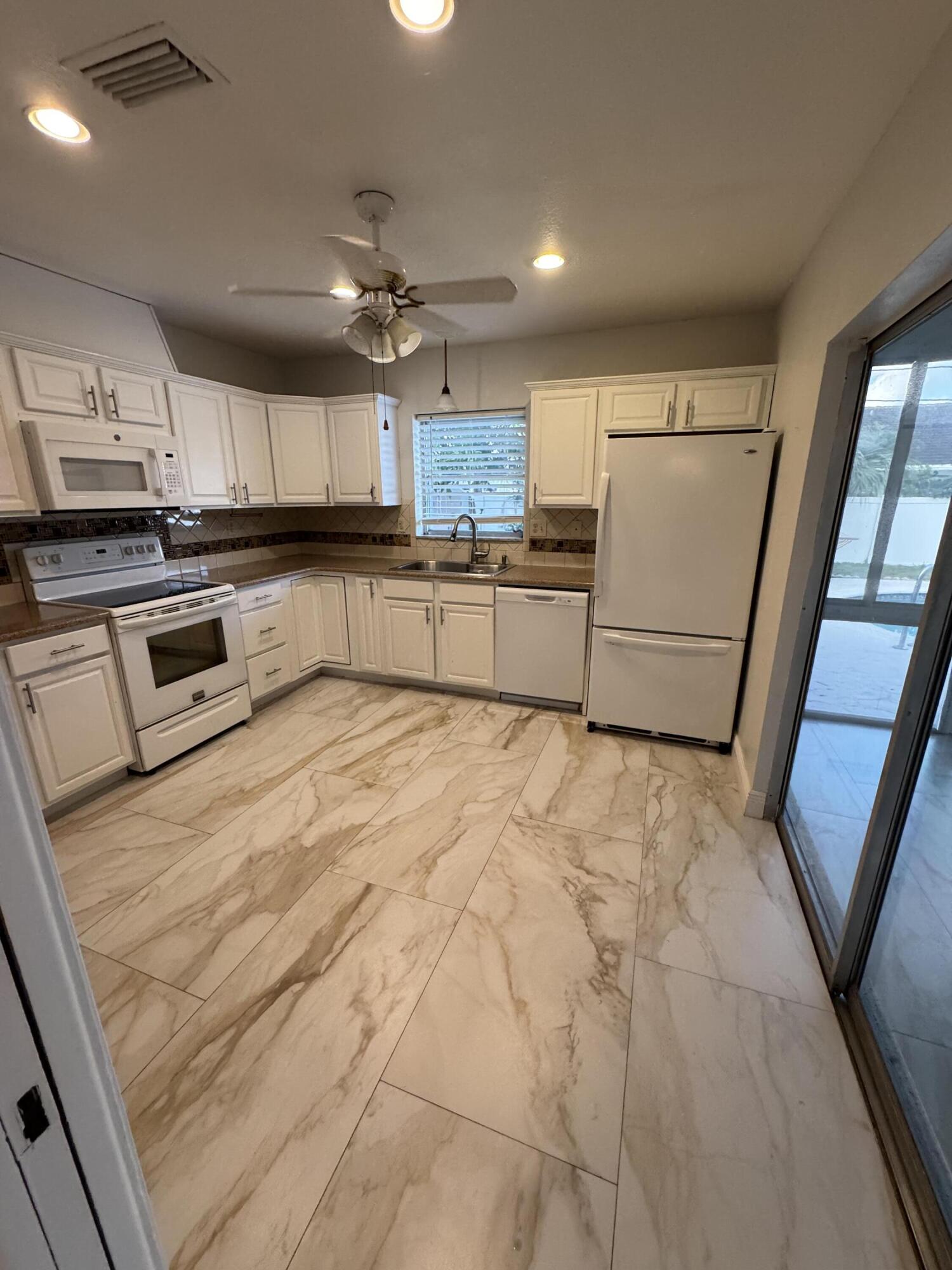 1385 Northwest 6th Street Boca Raton, FL 33486 - Photo 5 of 12 IMG_9324