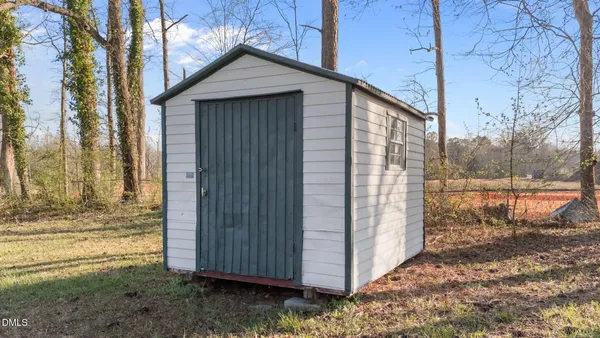a view of entrance gate of a house