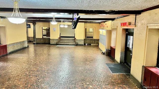 a view of a porch with two windows