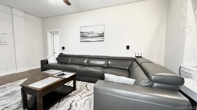 a living room with furniture and a couch