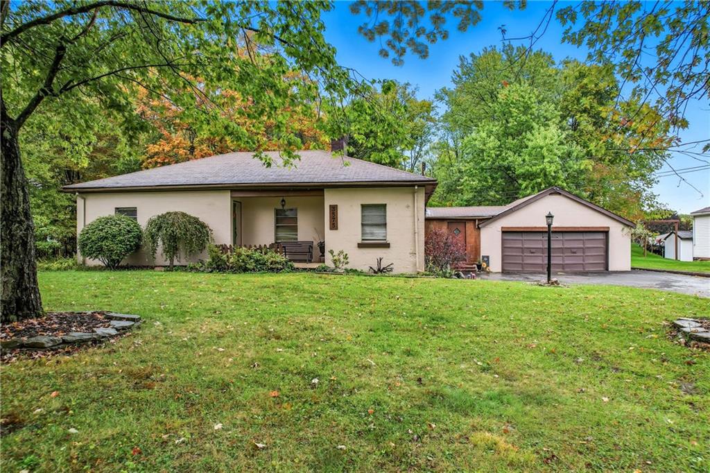 3575 Morefield Road Hermitage, PA 16148 - Photo 1 of 39 a front view of a house with garden