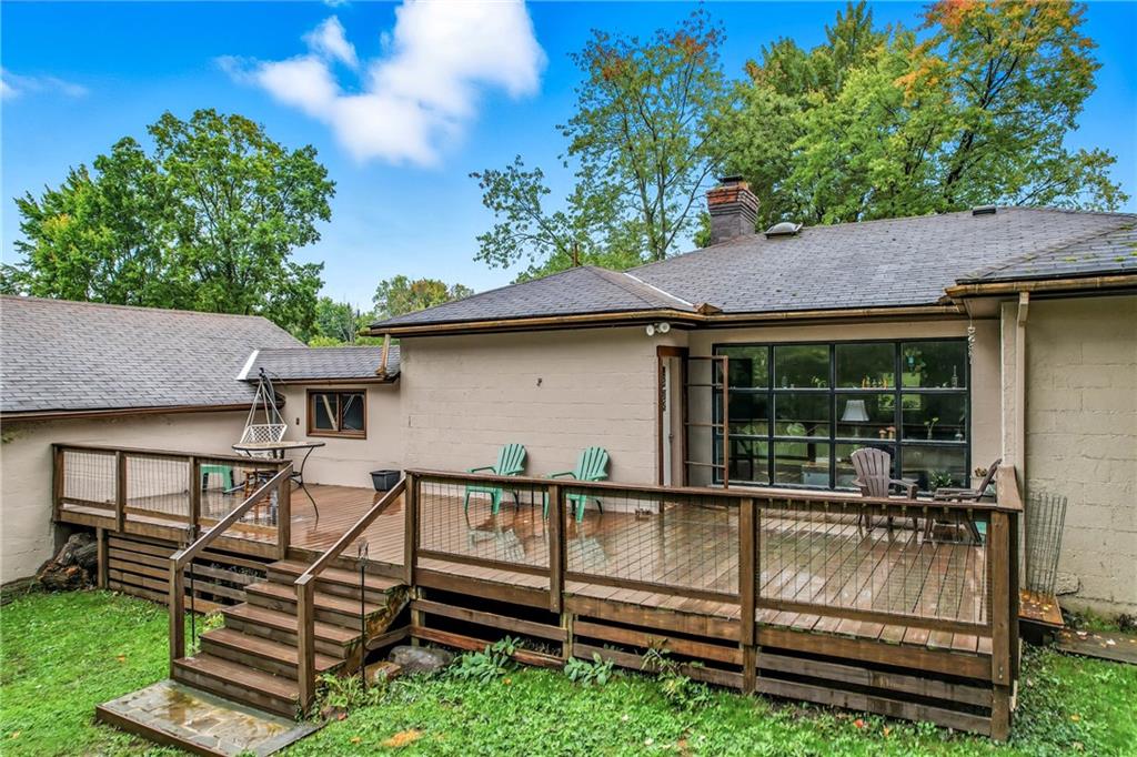 3575 Morefield Road Hermitage, PA 16148 - Photo 18 of 39 a view of a house with a yard and sitting area