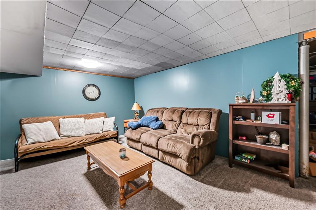 3575 Morefield Road Hermitage, PA 16148 - Photo 34 of 39 a living room with furniture and a couch
