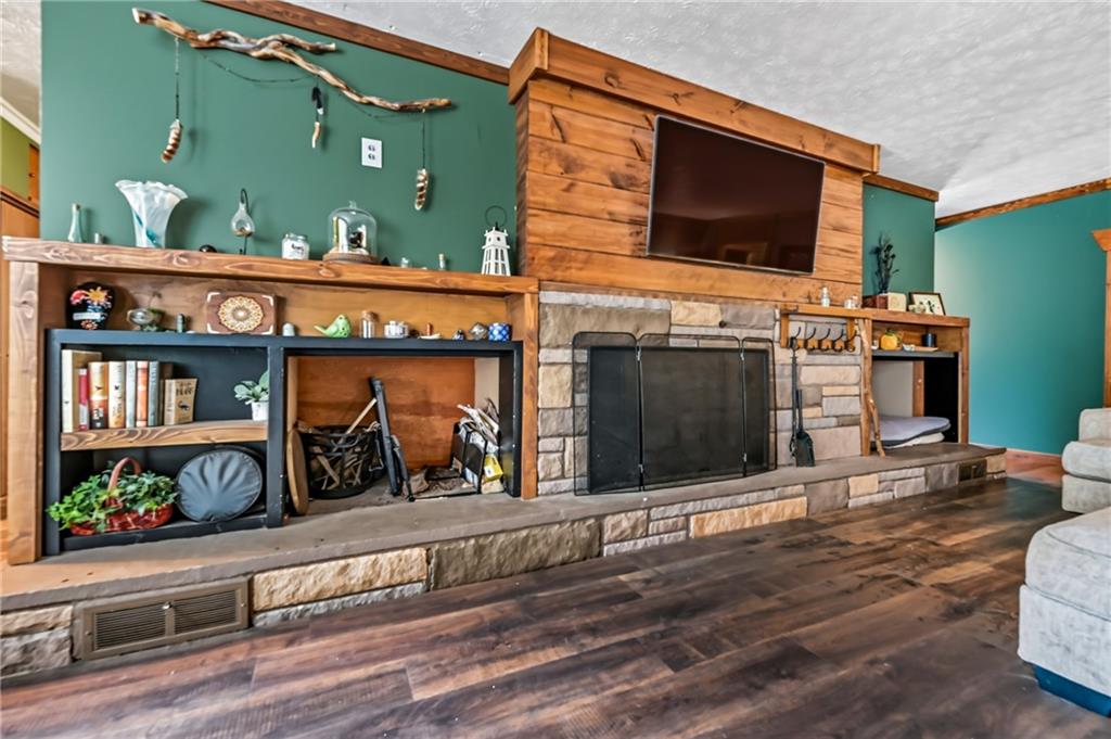 3575 Morefield Road Hermitage, PA 16148 - Photo 5 of 39 a view of a fireplace and cars in a room