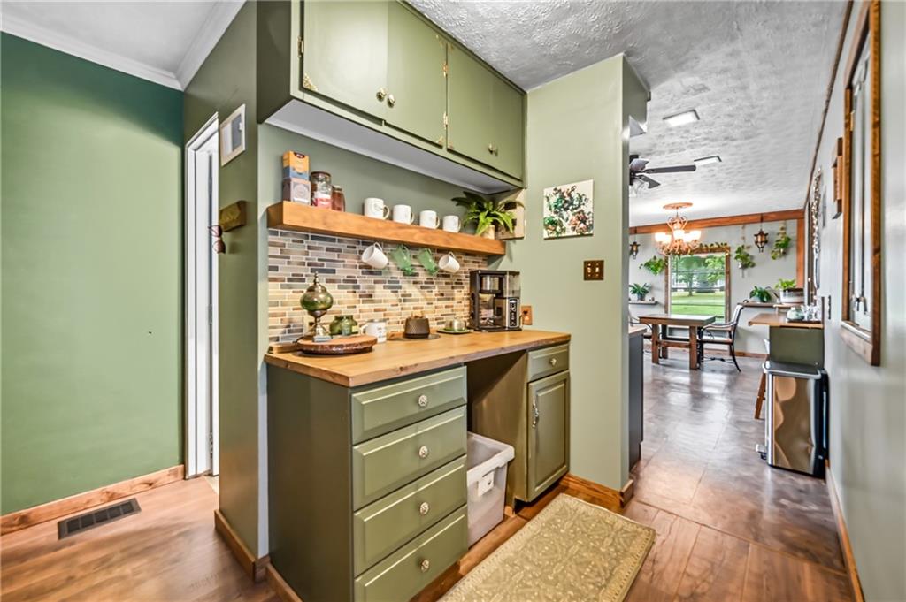 3575 Morefield Road Hermitage, PA 16148 - Photo 10 of 39 a kitchen with stainless steel appliances granite countertop a stove and a refrigerator