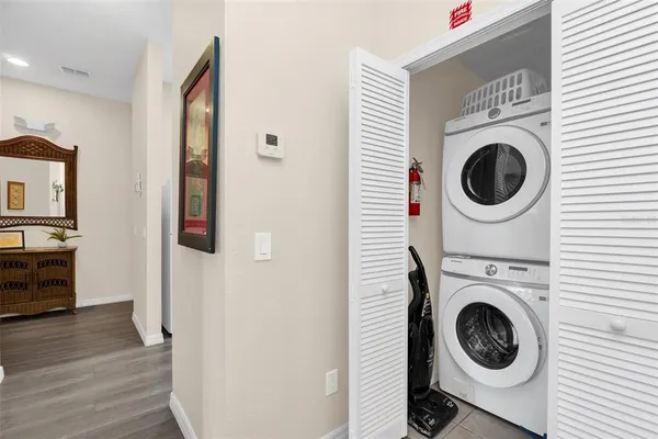 a utility room with dryer and washer