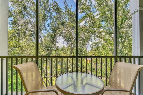 a view of a balcony with a swing