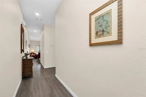 an entryway of a house and wooden floor
