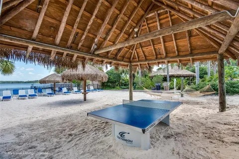 a view of a swimming pool with a patio