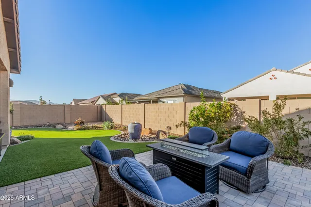 a view of a swimming pool with a bench