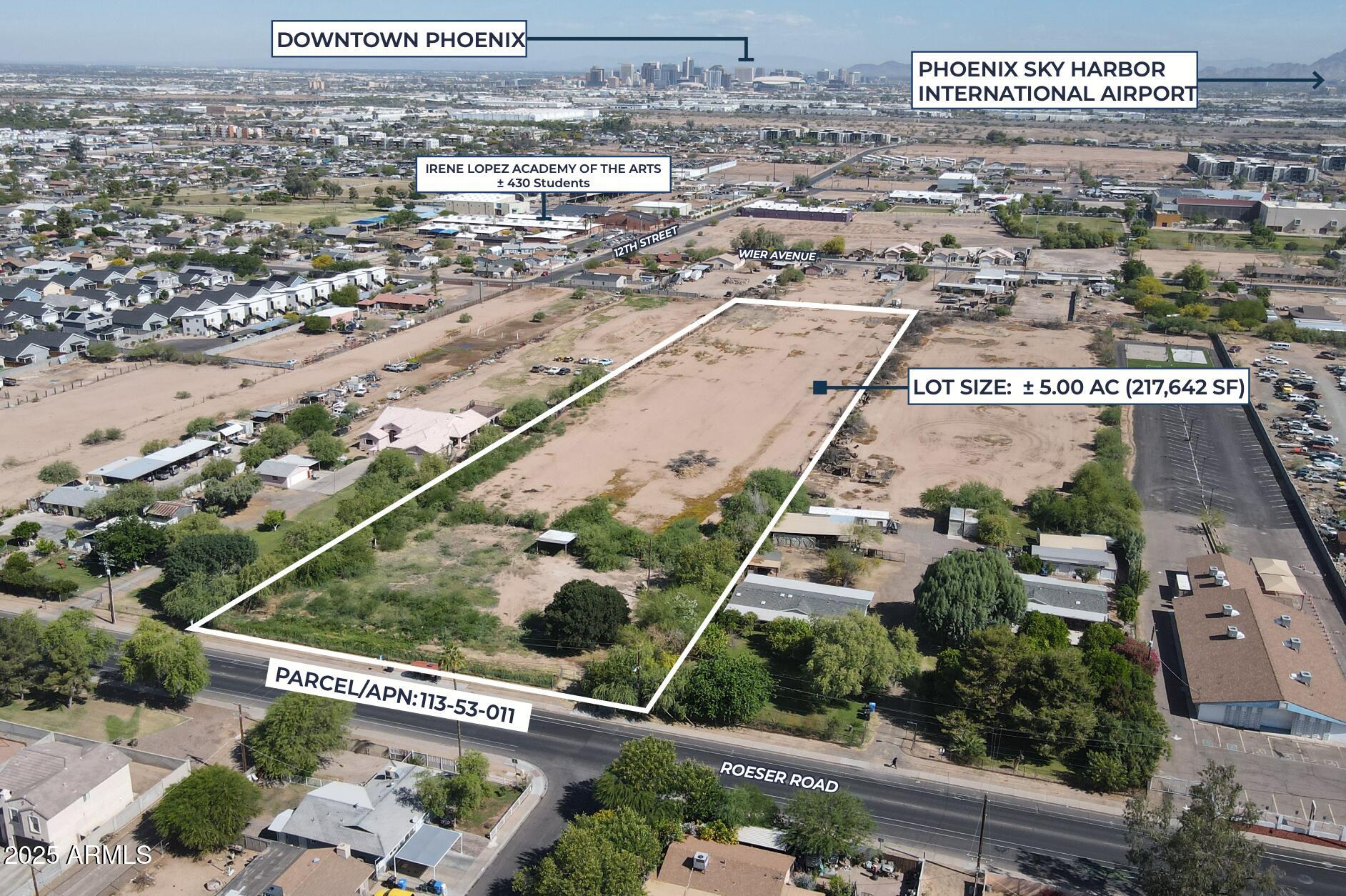 1230 East Roeser Road Phoenix, AZ 85040 - Photo 1 of 3 an aerial view of residential houses and lake