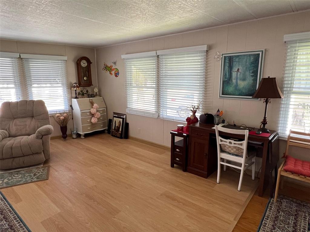 709 Sugar Palm Street Largo, FL 33778 - Photo 14 of 34 a livingroom with workspace and a window