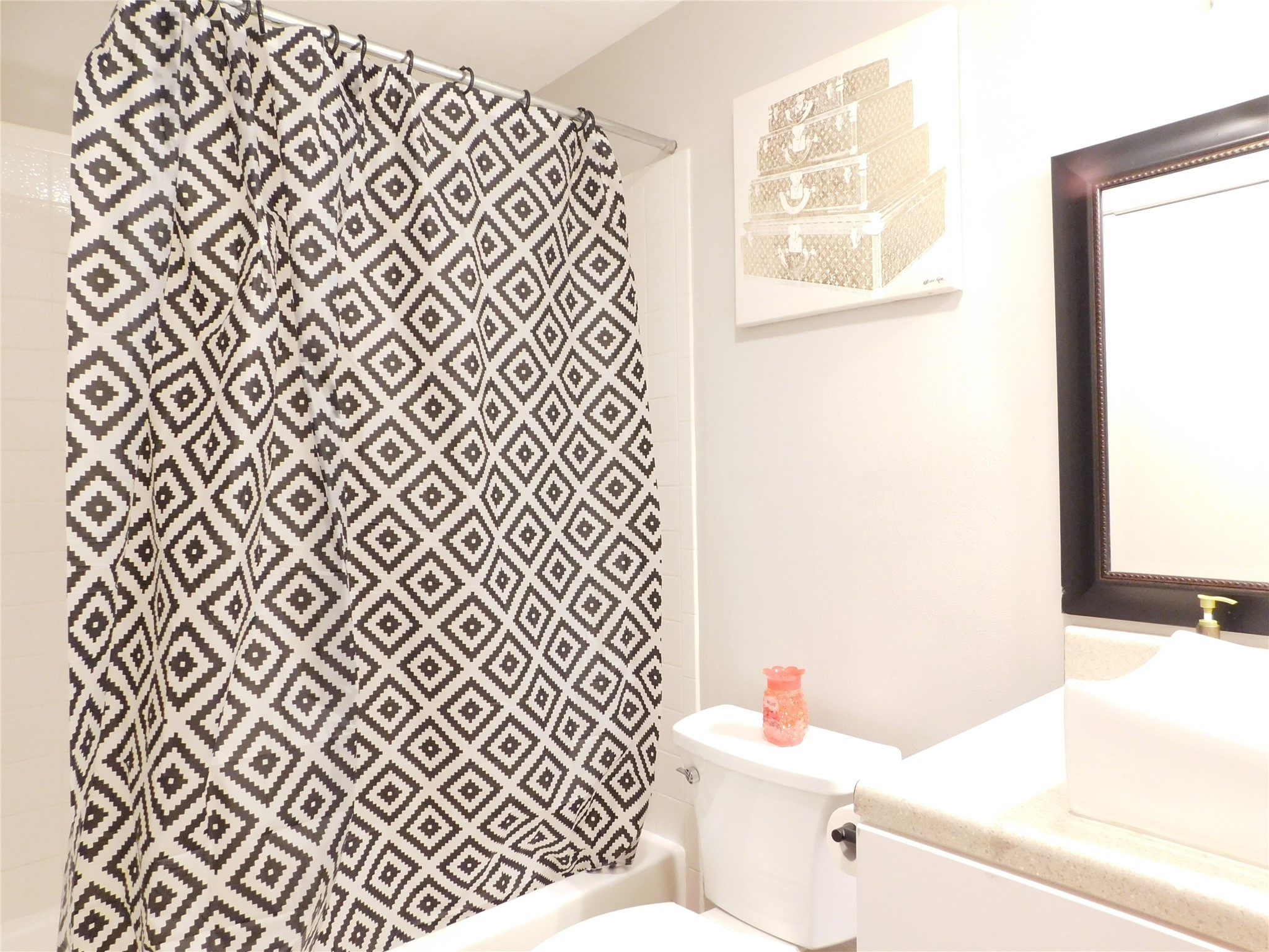 10101 South Gessner Road, Unit 912 Houston, TX 77071 - Photo 35 of 47 a bathroom with a sink and a toilet