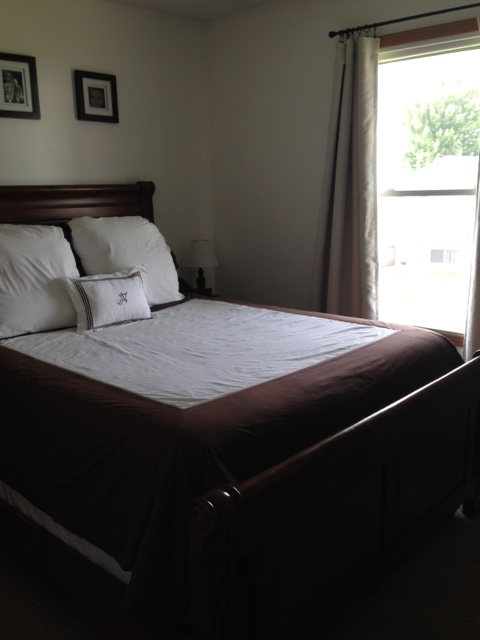 5438 Rockingham Drive Loves Park, IL 61111 - Photo 8 of 13 a bedroom with a bed and window