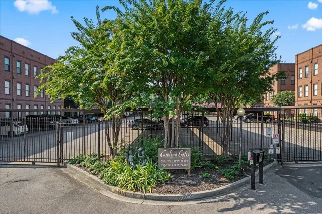 a view of a lake with a house in the background