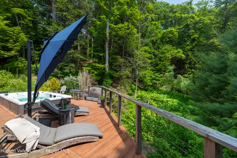 a balcony with chairs