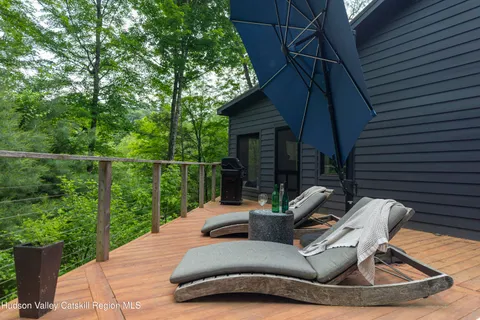 a view of a patio in the backyard