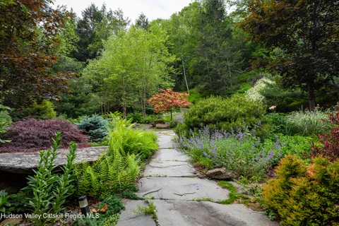 a view of a pathway with a park