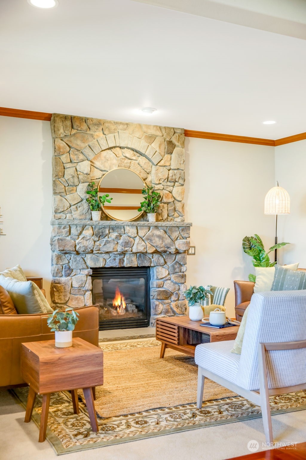 4013 214th Street Southeast Bothell, WA 98021 - Photo 18 of 40 a living room with furniture and a fireplace