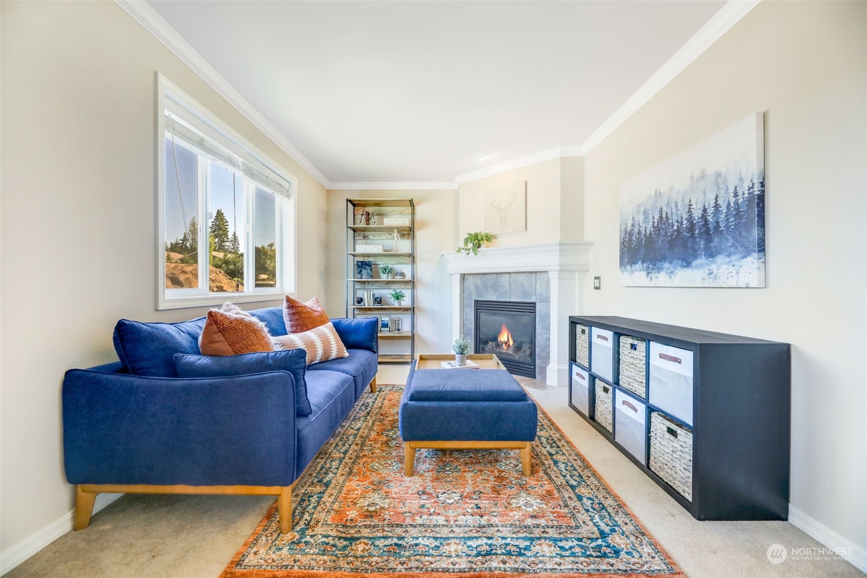 4013 214th Street Southeast Bothell, WA 98021 - Photo 25 of 40 a living room with furniture and a fireplace