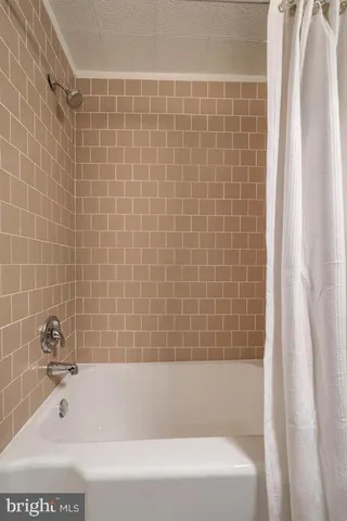 a bathroom with a bathtub