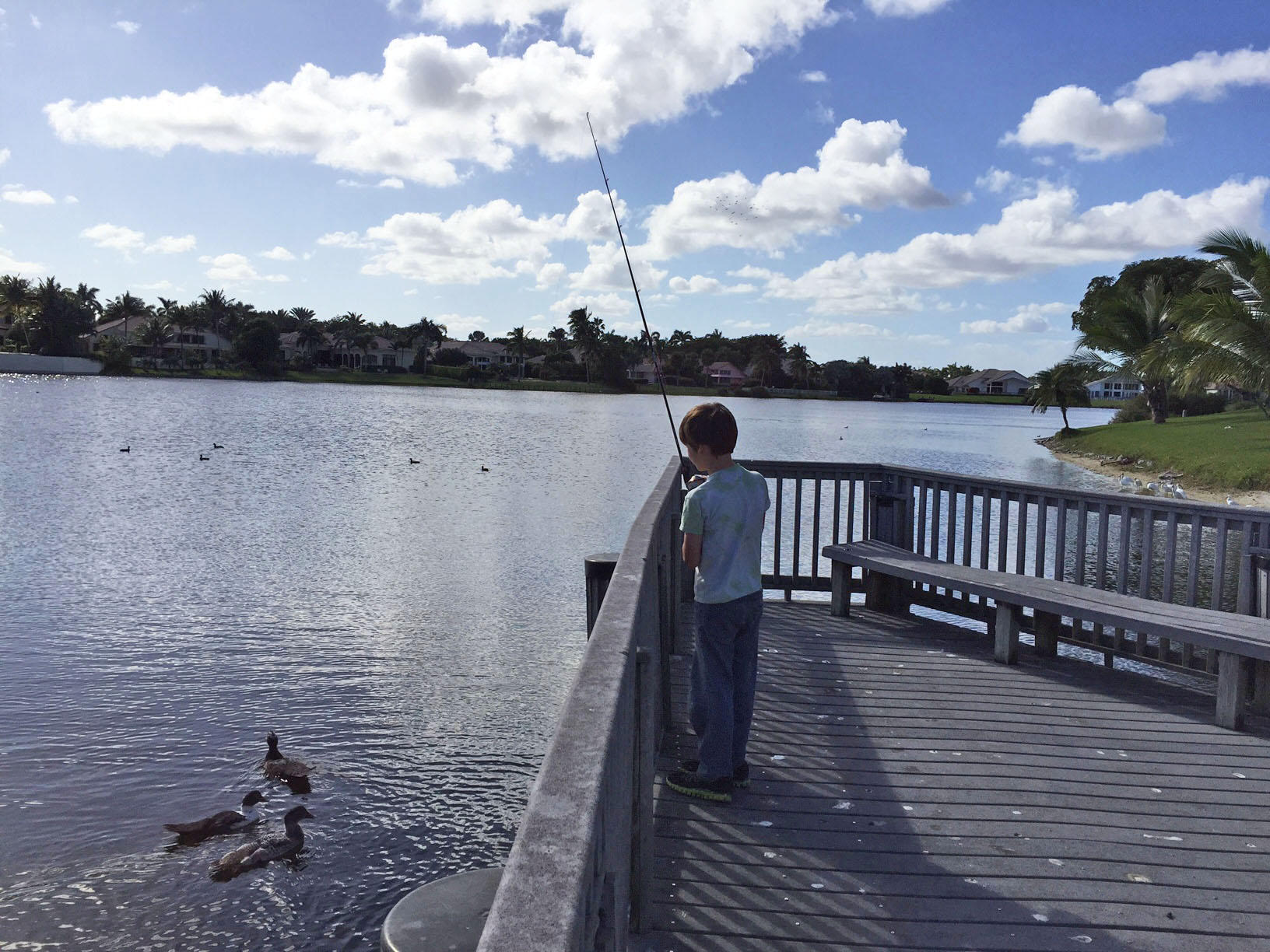 4809 Brandywine Drive Boca Raton, FL 33487 - Photo 31 of 32 Kid Fishing on Community Dock