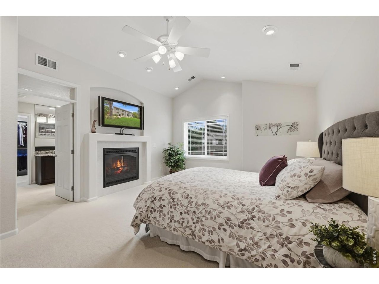 3754 Kentford Road Fort Collins, CO 80525 - Photo 26 of 50 A true second primary suite with vaulted ceiling, fireplace & private bath