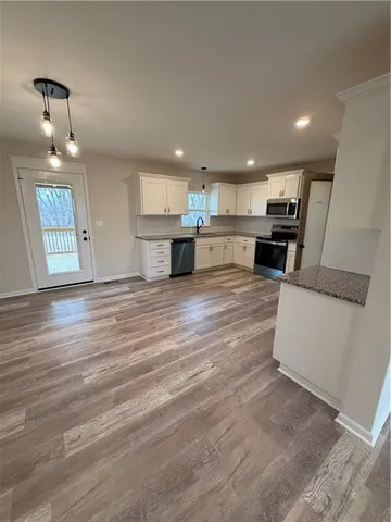 $330,000 | 1307 Northeast Sequoia Court, Oak Grove, MO 64075