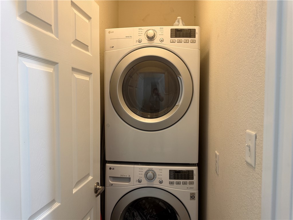 1001 Krenek Tap Road, Unit 2405 College Station, TX 77840 - Photo 13 of 24 a close up view of a washer and dryer