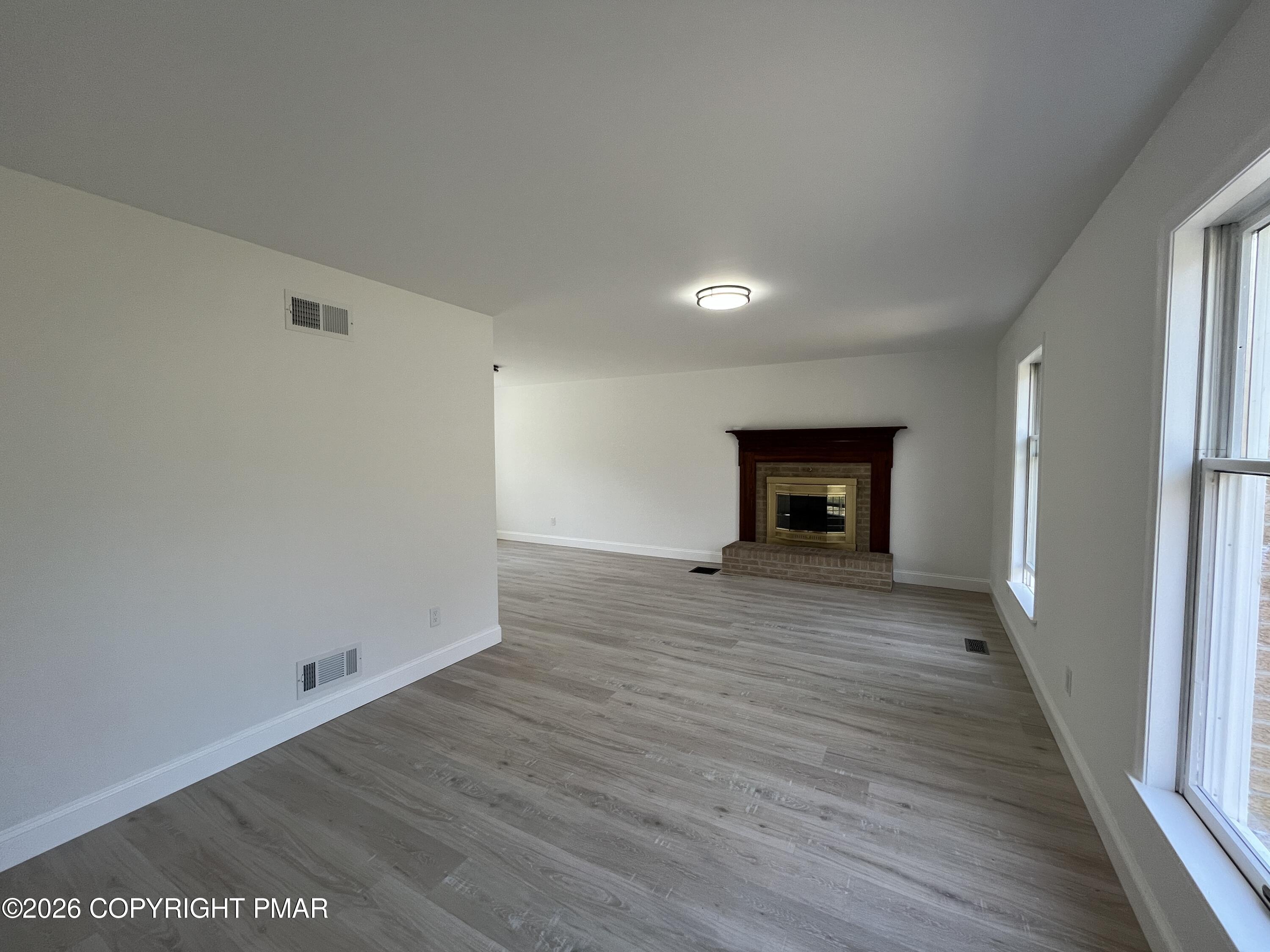 1281 Brian Lane Effort, PA 18330 - Photo 12 of 32 a view of a room with wooden floor and a window
