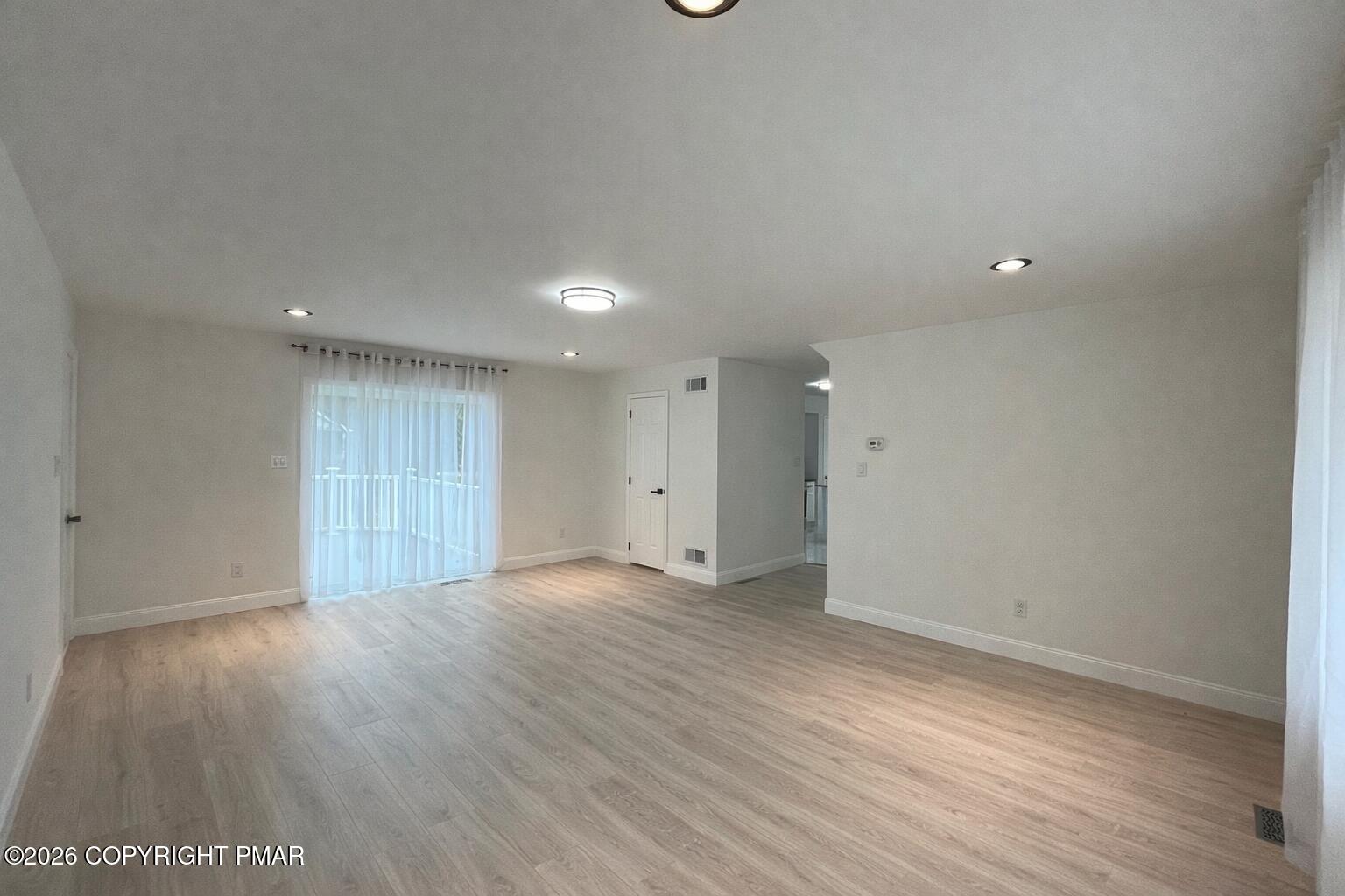 1281 Brian Lane Effort, PA 18330 - Photo 14 of 32 a view of an empty room with wooden floor