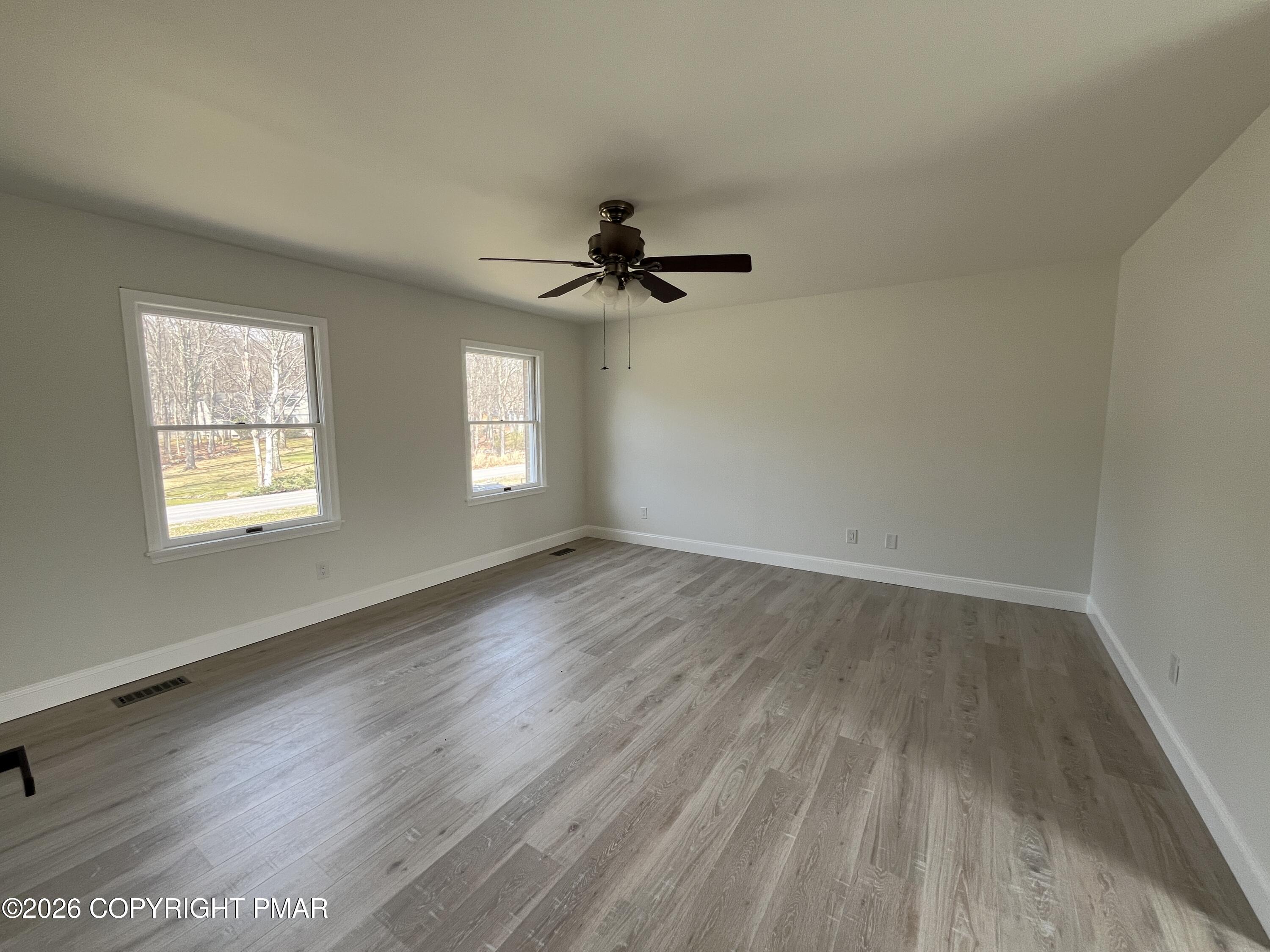 1281 Brian Lane Effort, PA 18330 - Photo 17 of 32 wooden floor in an empty room with a window