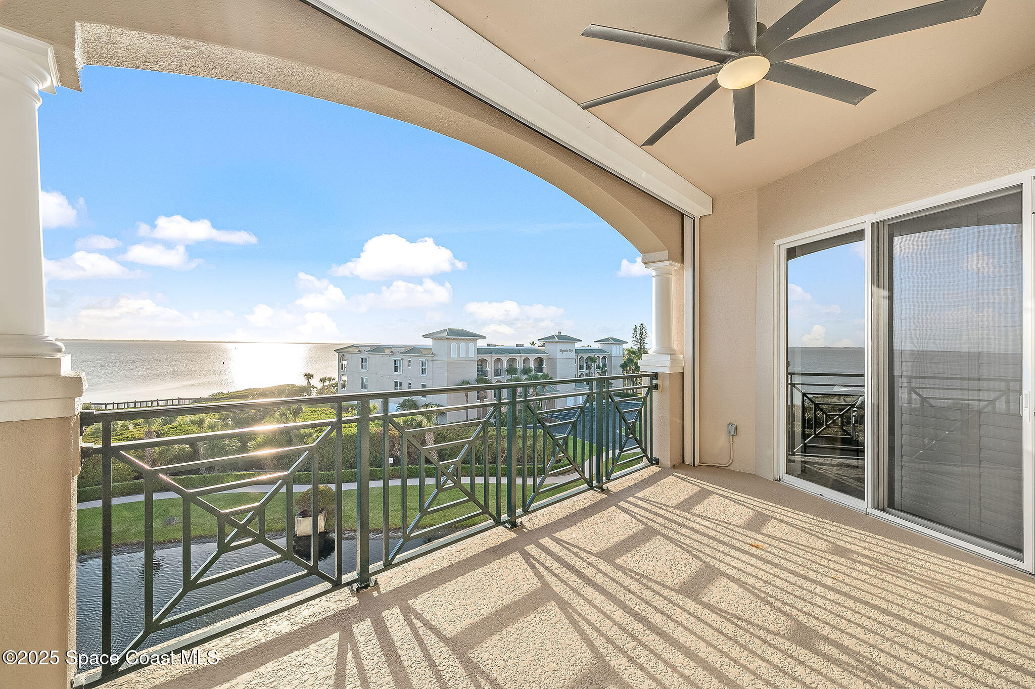 2012 Julep Drive, Unit 304 Cocoa Beach, FL 32931 - Photo 16 of 67 a view of a balcony with furniture